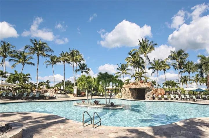 Community pool with a patio area