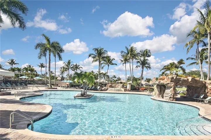 Community pool with a patio area