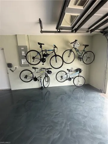 Garage with a textured wall and bike storage