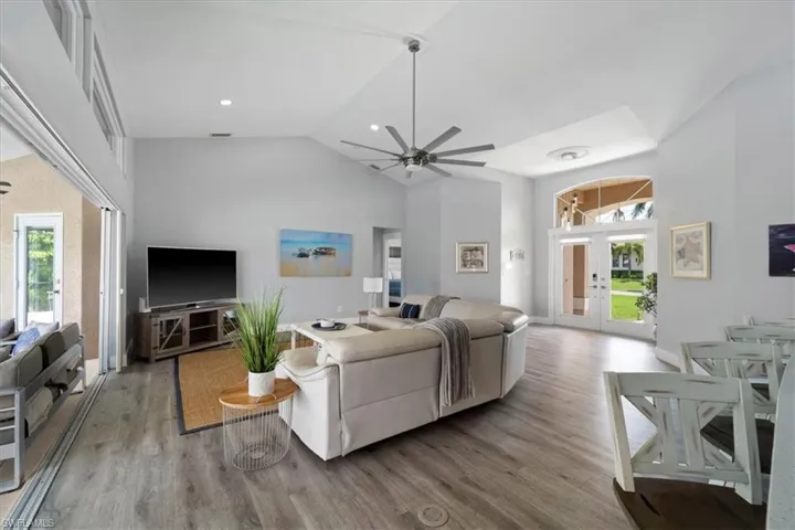 Bright sunny space with pocketing sliders to the lanai.