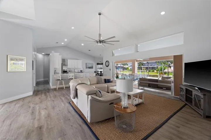 Bright sunny space with pocketing sliders to the lanai.