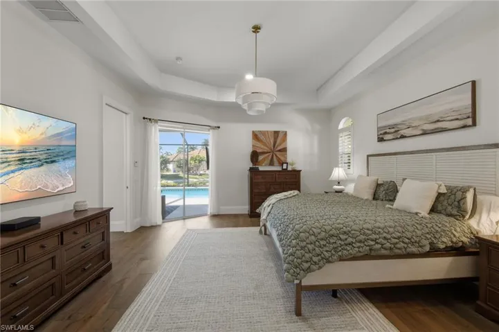 primary suite with direct access to lanai
