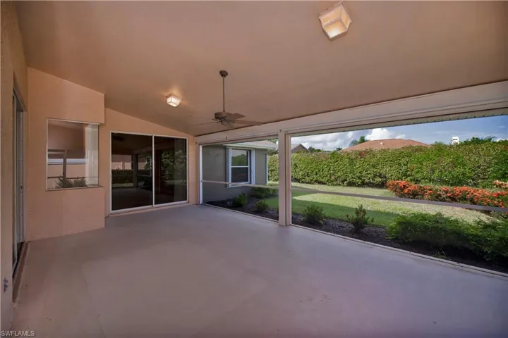 HUGE screened lanai with electric roll down shutters