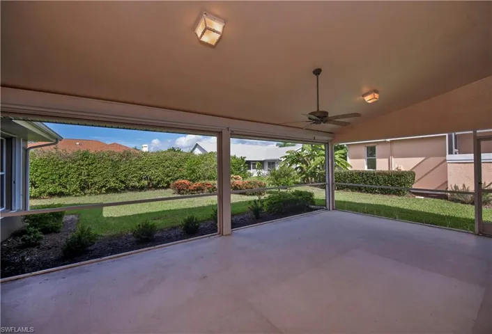 HUGE screened lanai with electric roll down shutters
