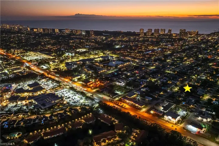Aerial view at dusk with a water view