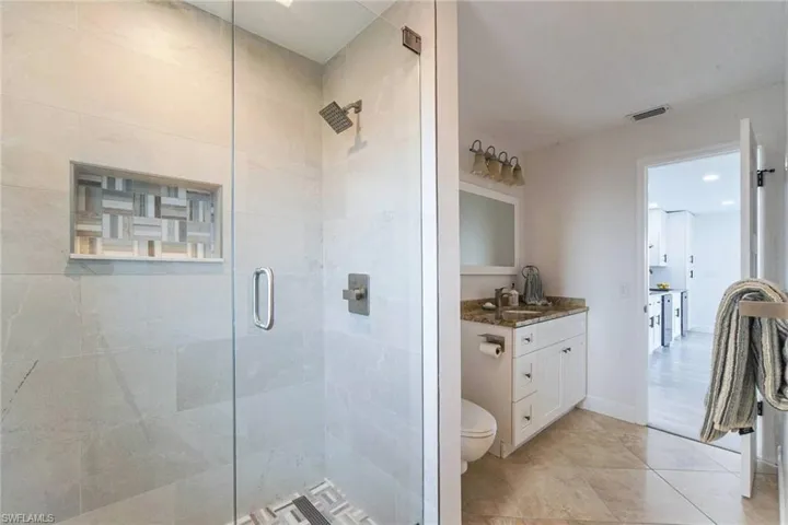 Guest bath #3 is both en-suite and accessible from main living area