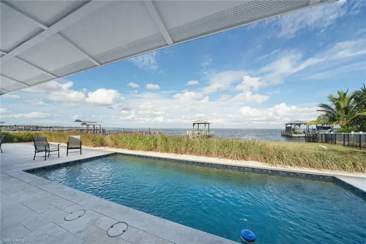 Lovely pool with pebbletech finish and surrounded by Travertine decking. Offers endless water views over Matlacha Pass!
