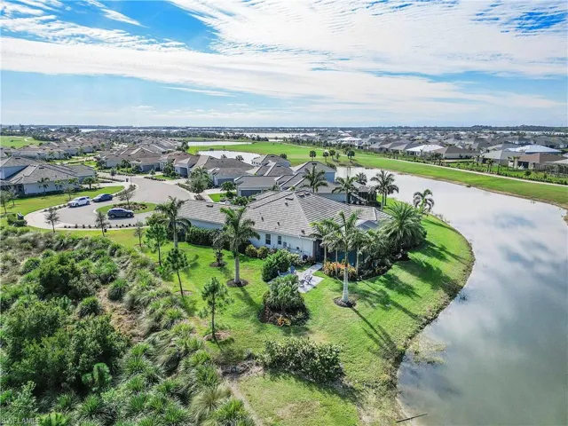 Aerial view with a residential view and a water view