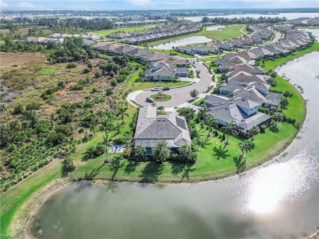 Bird's eye view with a residential view and a water view