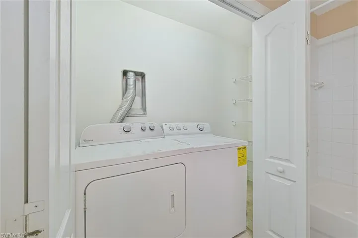 Laundry area featuring washing machine and dryer