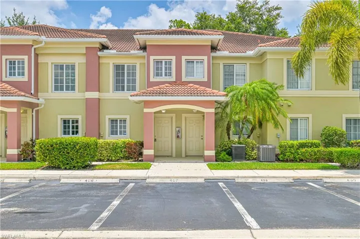 View of front of house with central AC unit
