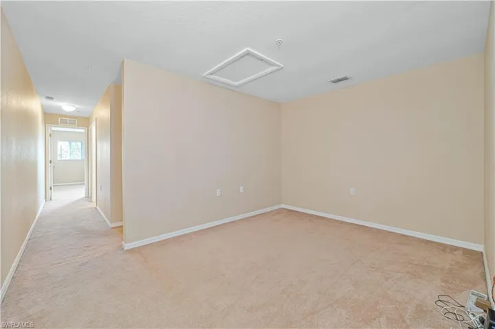 View of carpeted spare room