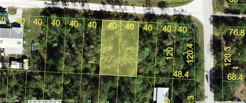 Aerial map of property and surrounding area featuring property boundaries highlighted