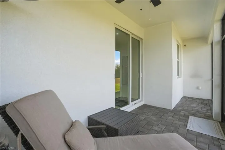 View of patio / terrace featuring a ceiling fan