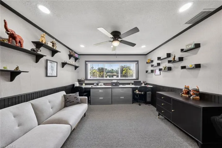 Versatile room featuring recessed lighting, a ceiling fan, a window with horizontal blinds, and a combination of wainscoting and wallpapered walls