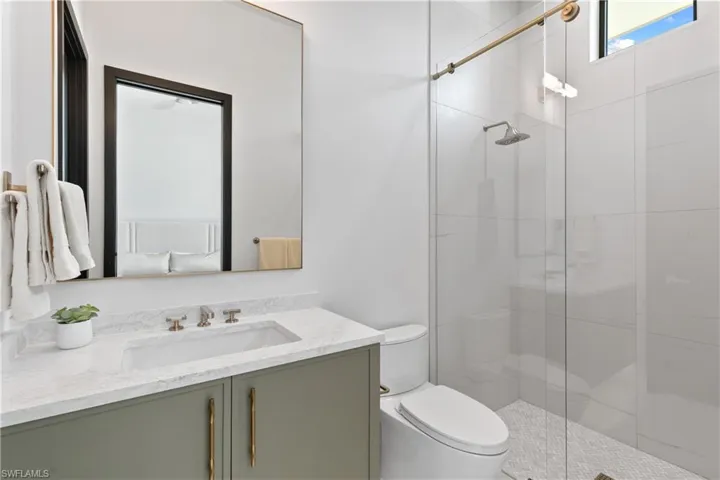 2nd full bath offers a walk-in shower.