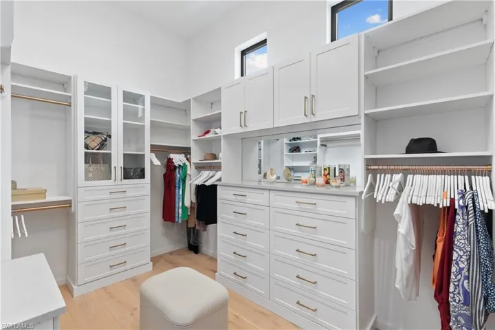 This is 1 of 2 walk-in custom designed closets in the primary suite.