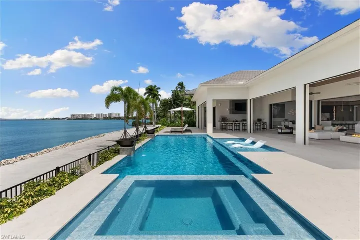 Salt water, gas heated pool and spa, built-in sun shelf. Outdoor shower.