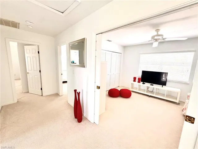 Carpeted office / den / 4th bedroom with ceiling fan