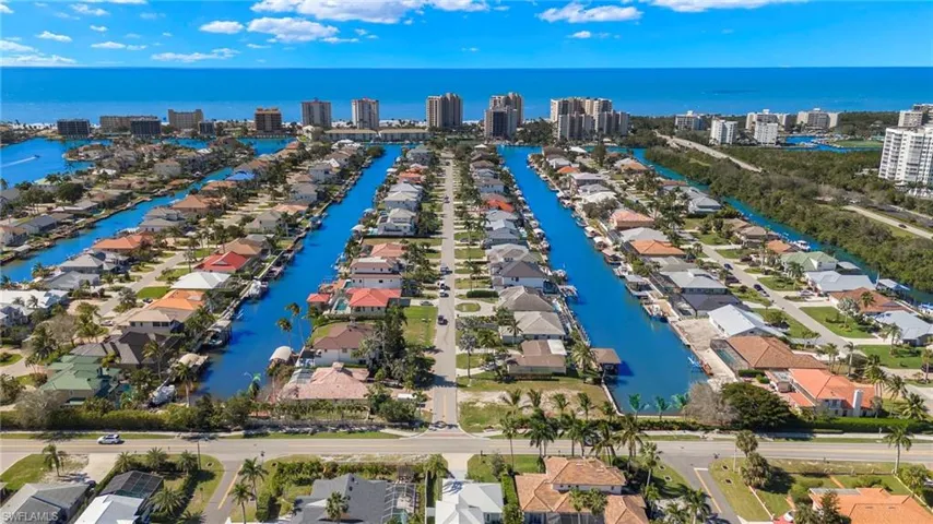 Aerial view of a canal-front property, providing direct access to waterways