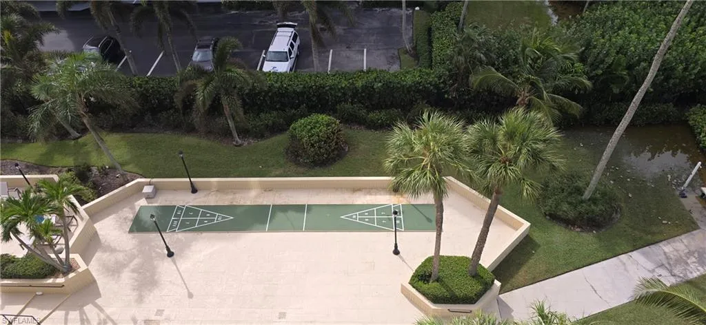 View of home's community featuring a yard