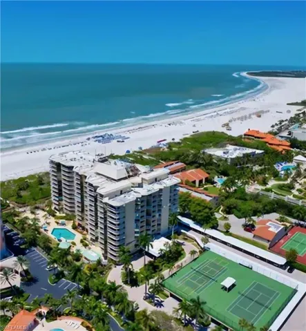 Bird's eye view with a beach view and a water view