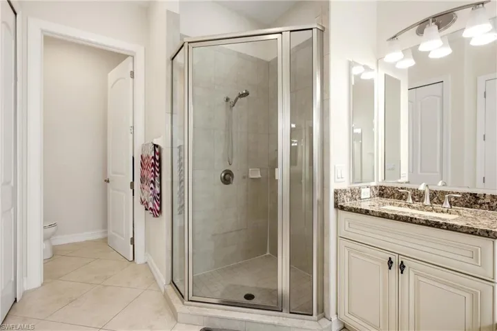 Master bath showing shower, closet & privy
