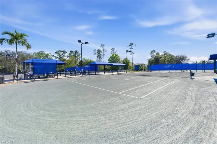 View of tennis/pickleball court featuring community basketball court