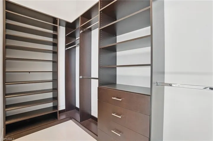 View of walk in closet Virtually Enhanced