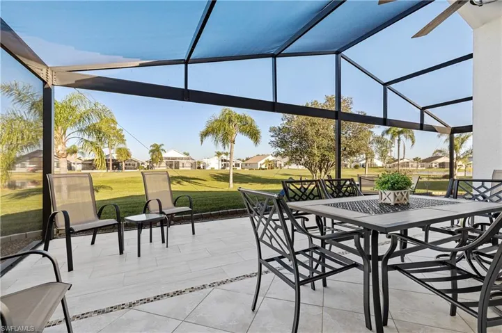 View of patio with glass enclosure
