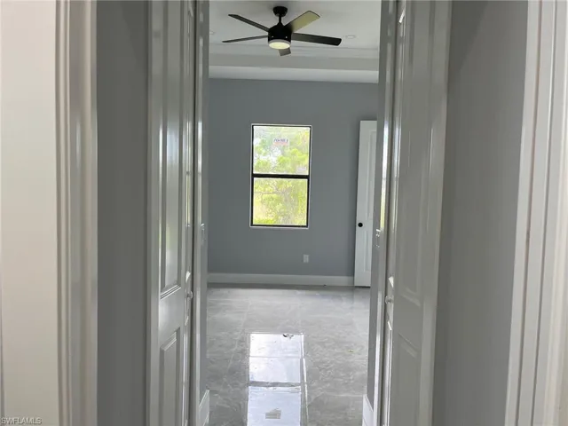 Corridor with tile floors