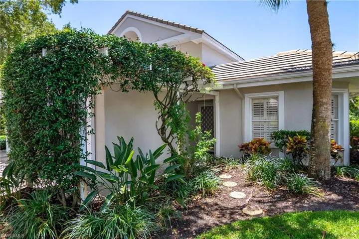 Lovely walkway with bougainvillea leading to front door