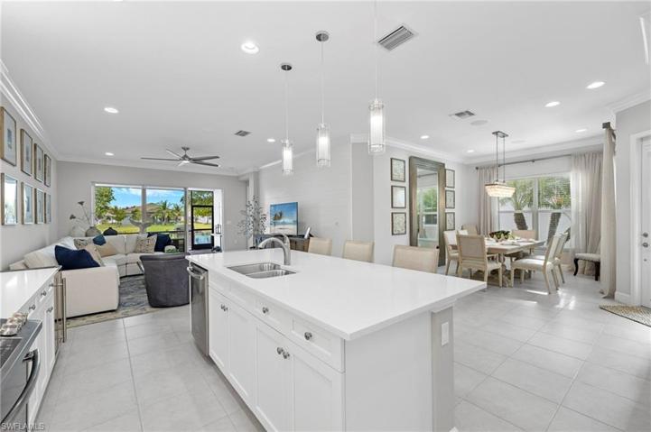 Beautiful spacious open floor plan looking out through the lanai to the water.