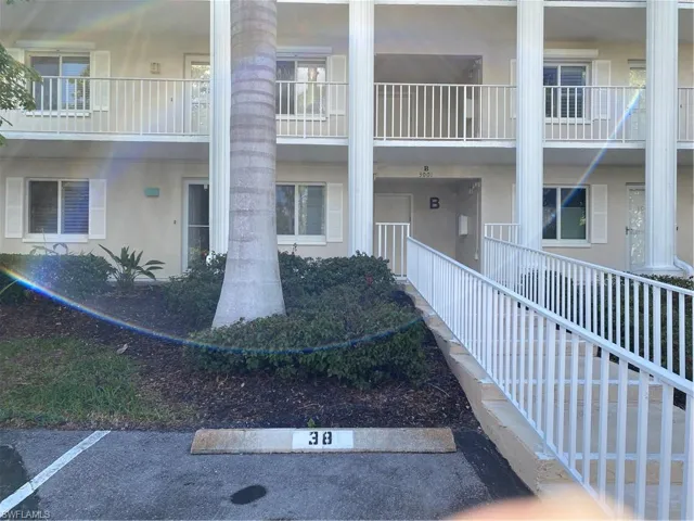 Surrounding community featuring uncovered parking