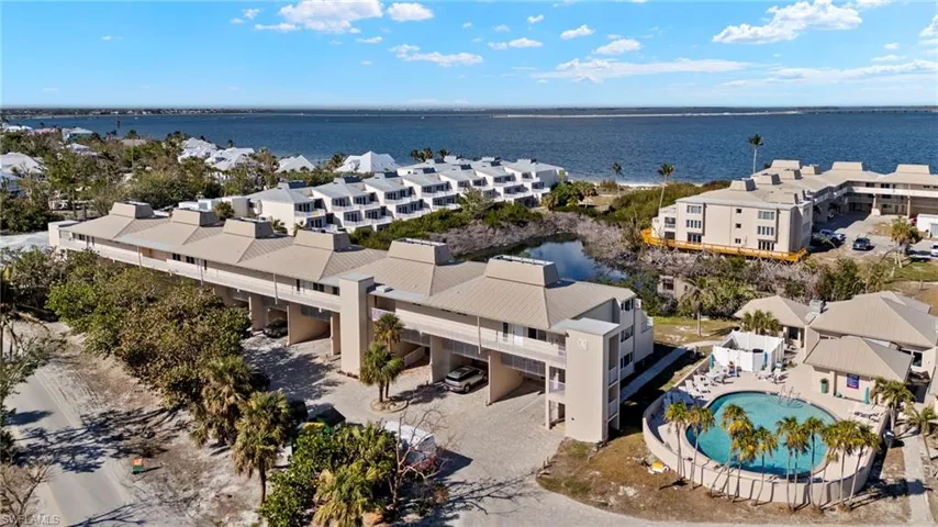 Aerial view of a large body of water and a pool