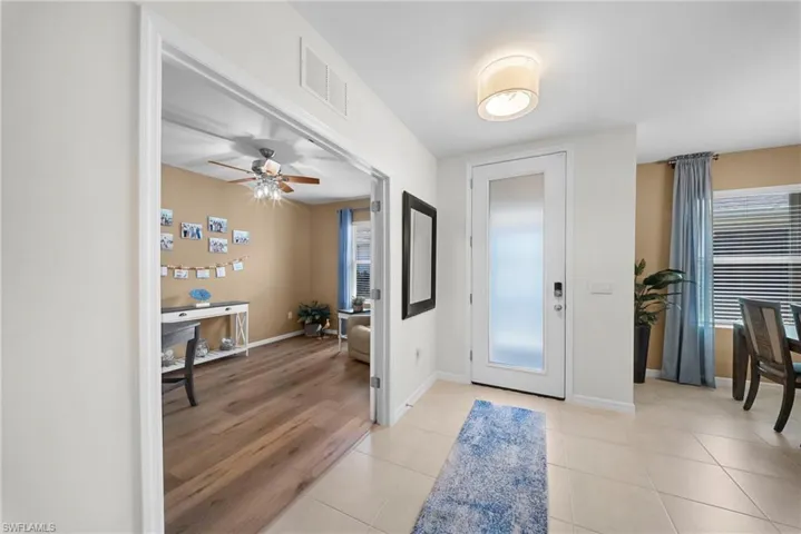 Entry with office / den with french doors opened