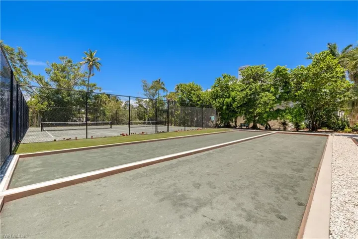 Surrounding community with tennis court