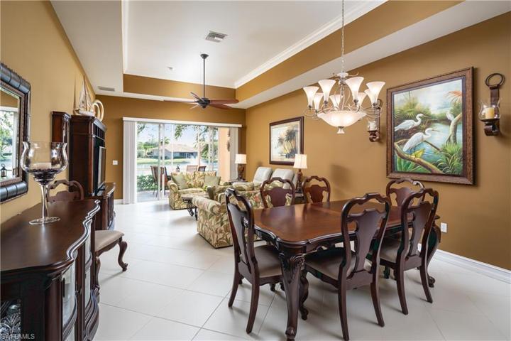 Dining & Living with fabulous view of lake & fountain