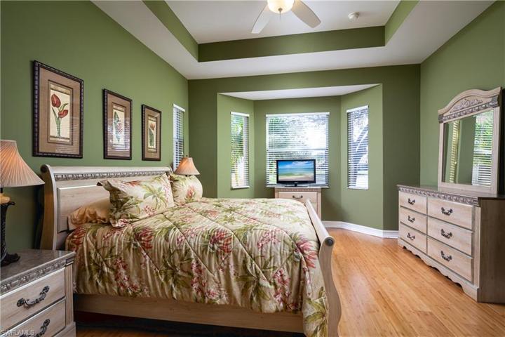 Master Bedroom has gorgeous view of lake from bay windows