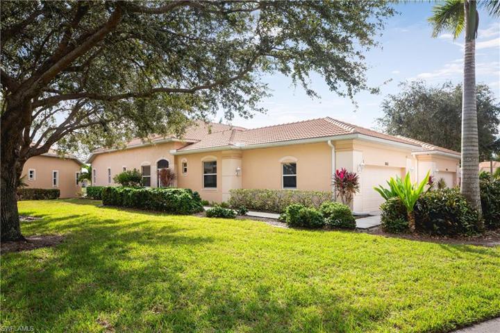 Large side yard leading to front entry of home