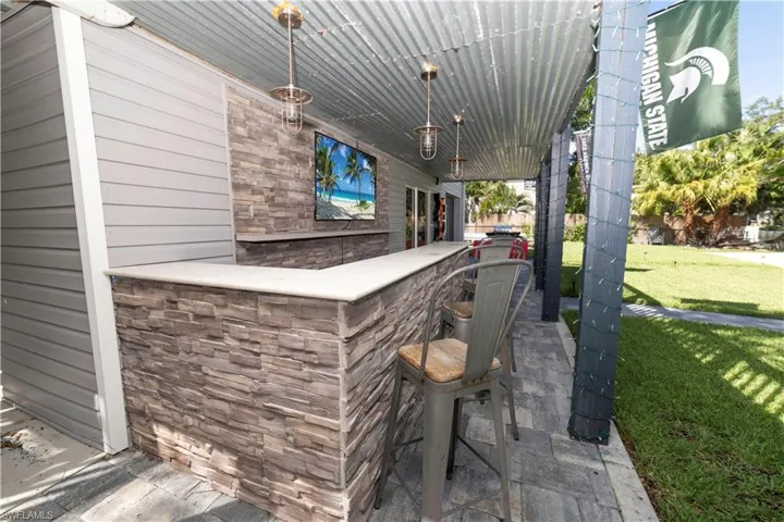 View of patio / terrace with an outdoor bar