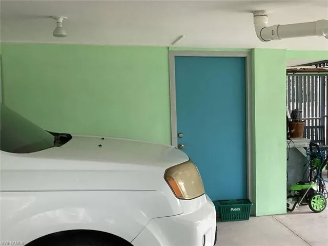Laundry area with washing machine and clothes dryer