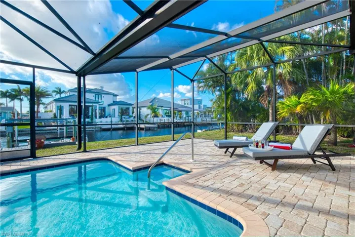 View of pool with a patio area