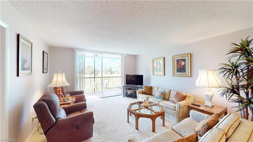 living room with lots of natural light from the lanai