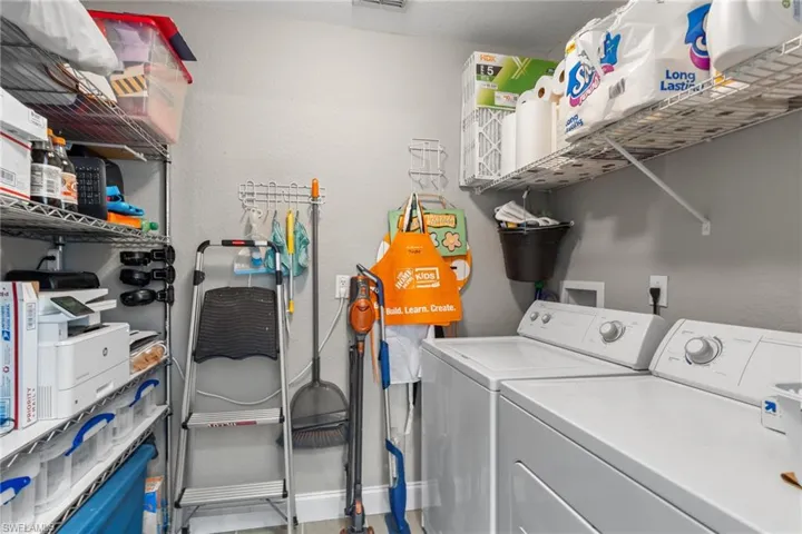 Laundry room with separate washer and dryer