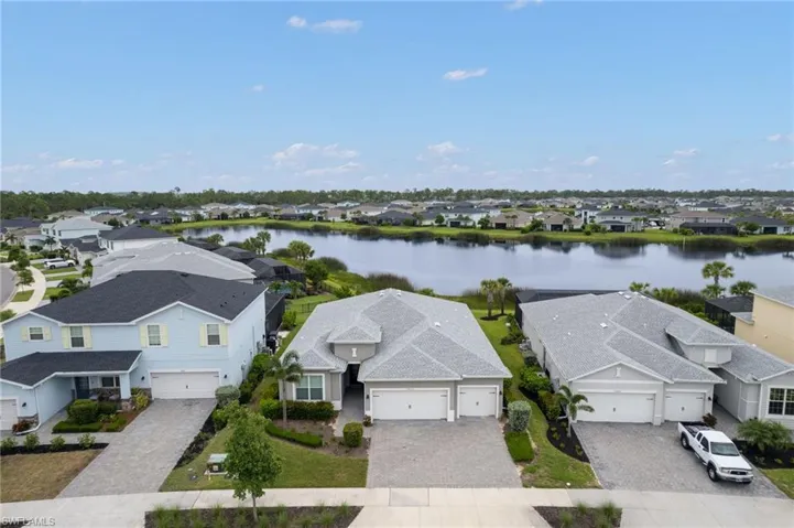 Aerial view of residential area with a nearby body of water