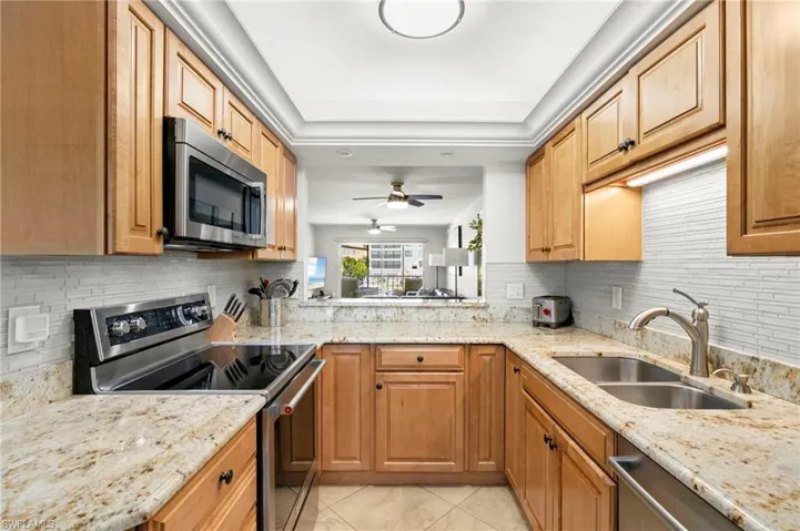 Glorious granite countertops and hardwood cabinets
