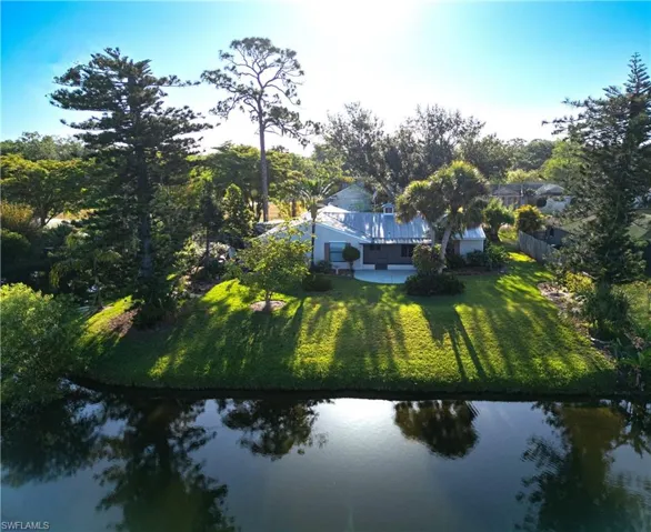 View of subject property with a large body of water