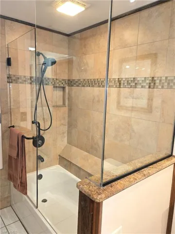 Bathroom with shower / tub combination