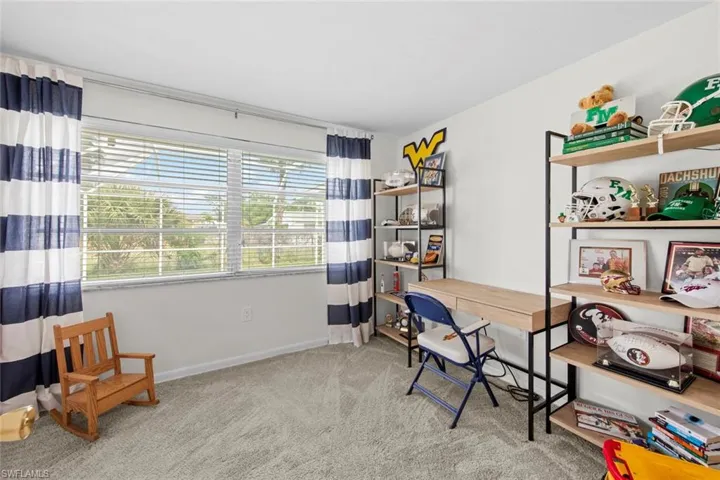 Wall removed to make this bedroom larger.